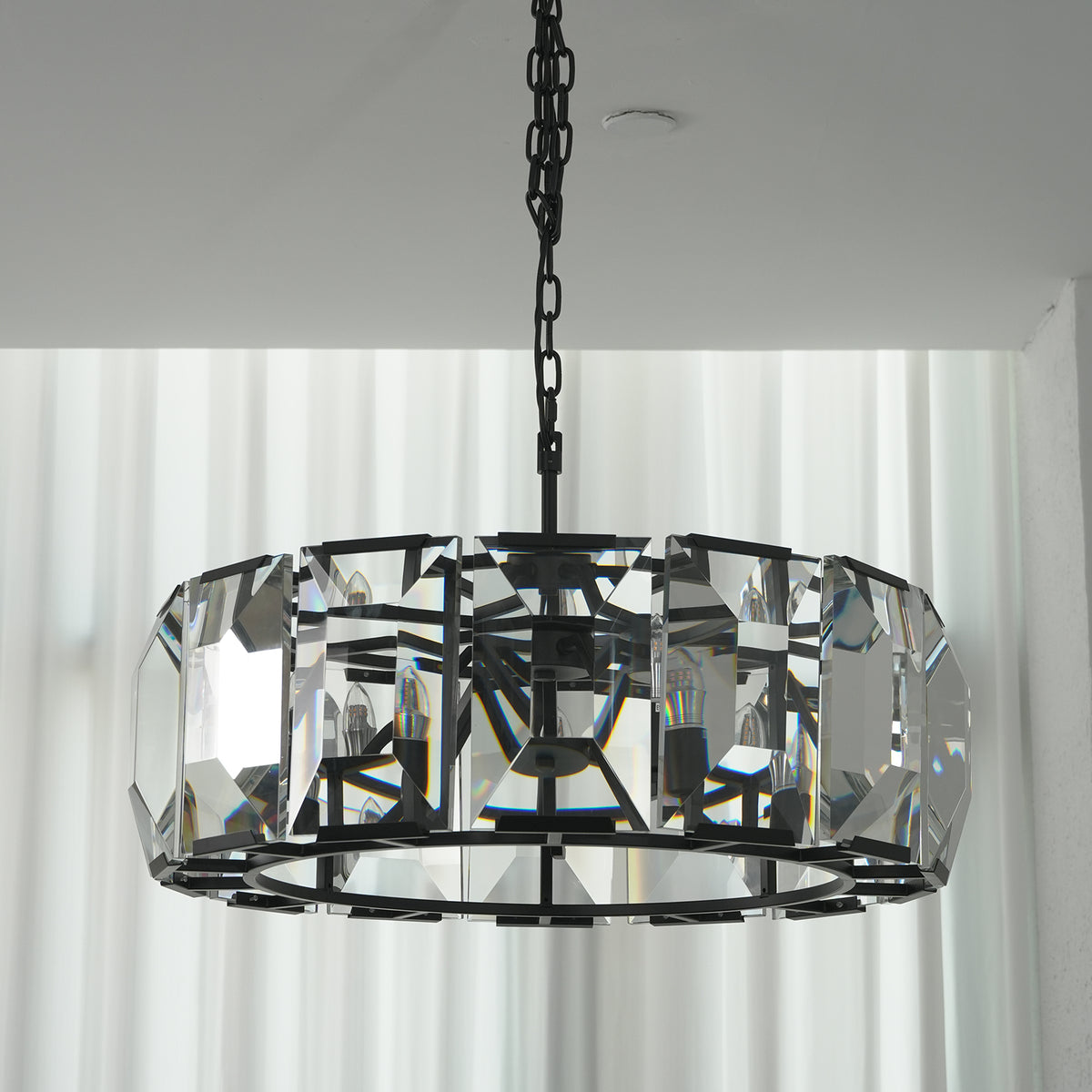 Cut_Glass_Chandelier_in_Bright_Space_With_Sheer_Curtains_Metavaya