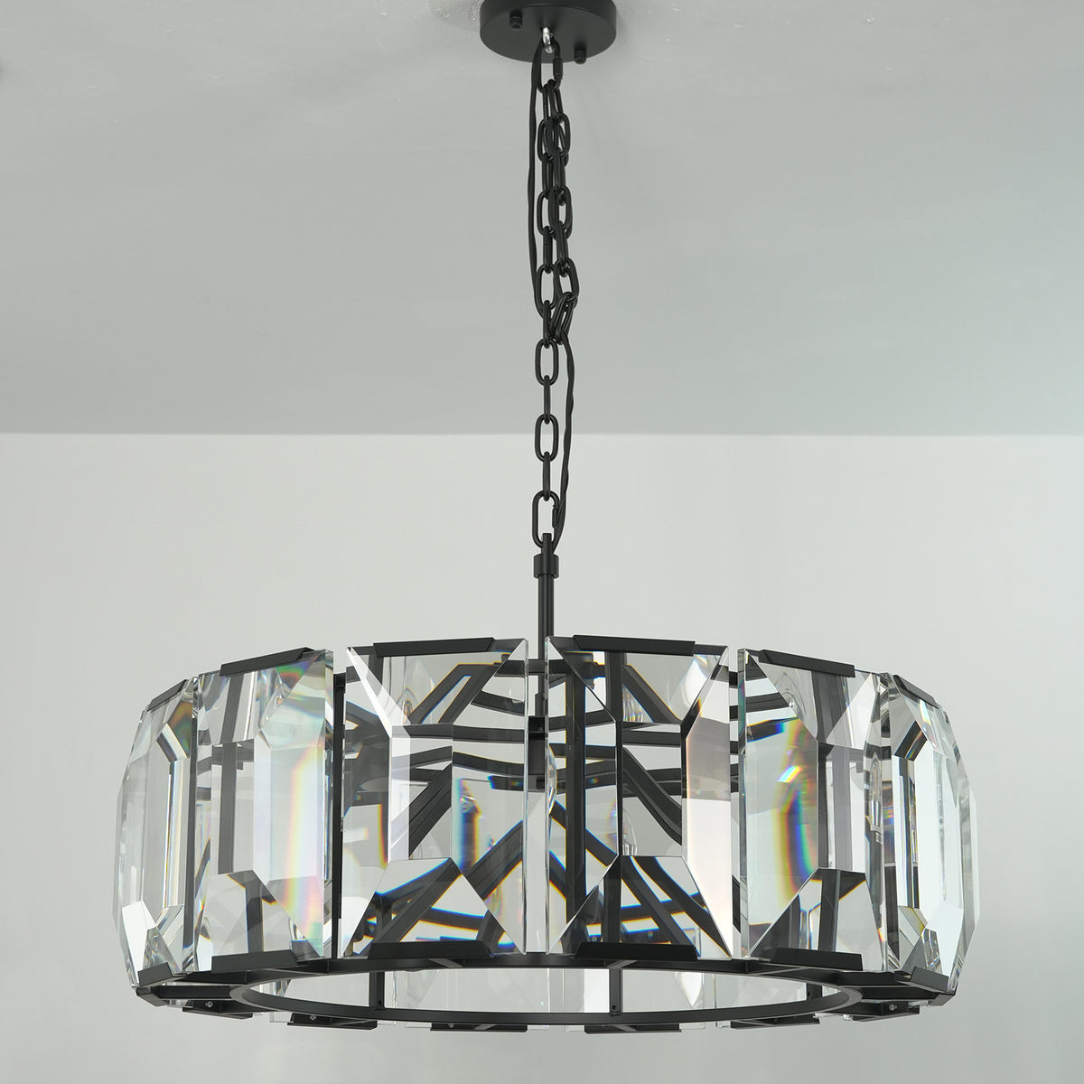 Cut_Glass_Chandelier_Front_View_on_Light_White_Wall_Metavaya