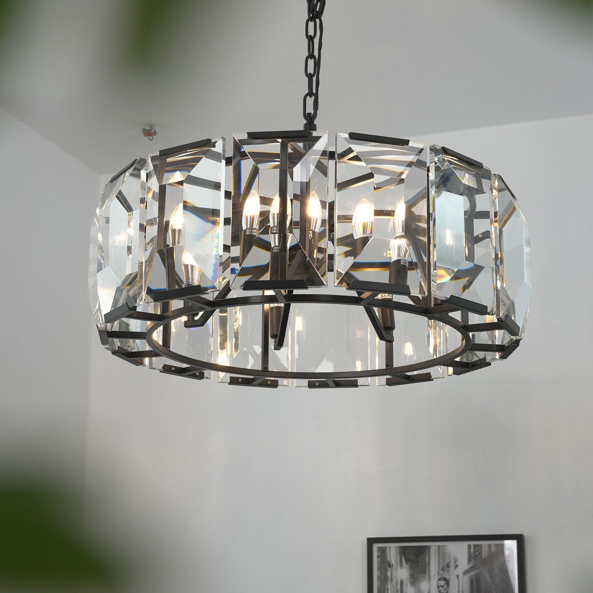 Cut_Glass_Chandelier_by_Large_Window_With_Greenery_Metavaya