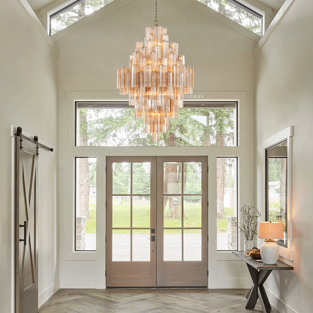 Addis Diamond Chandelier with amber glass in a bright entryway with double doors