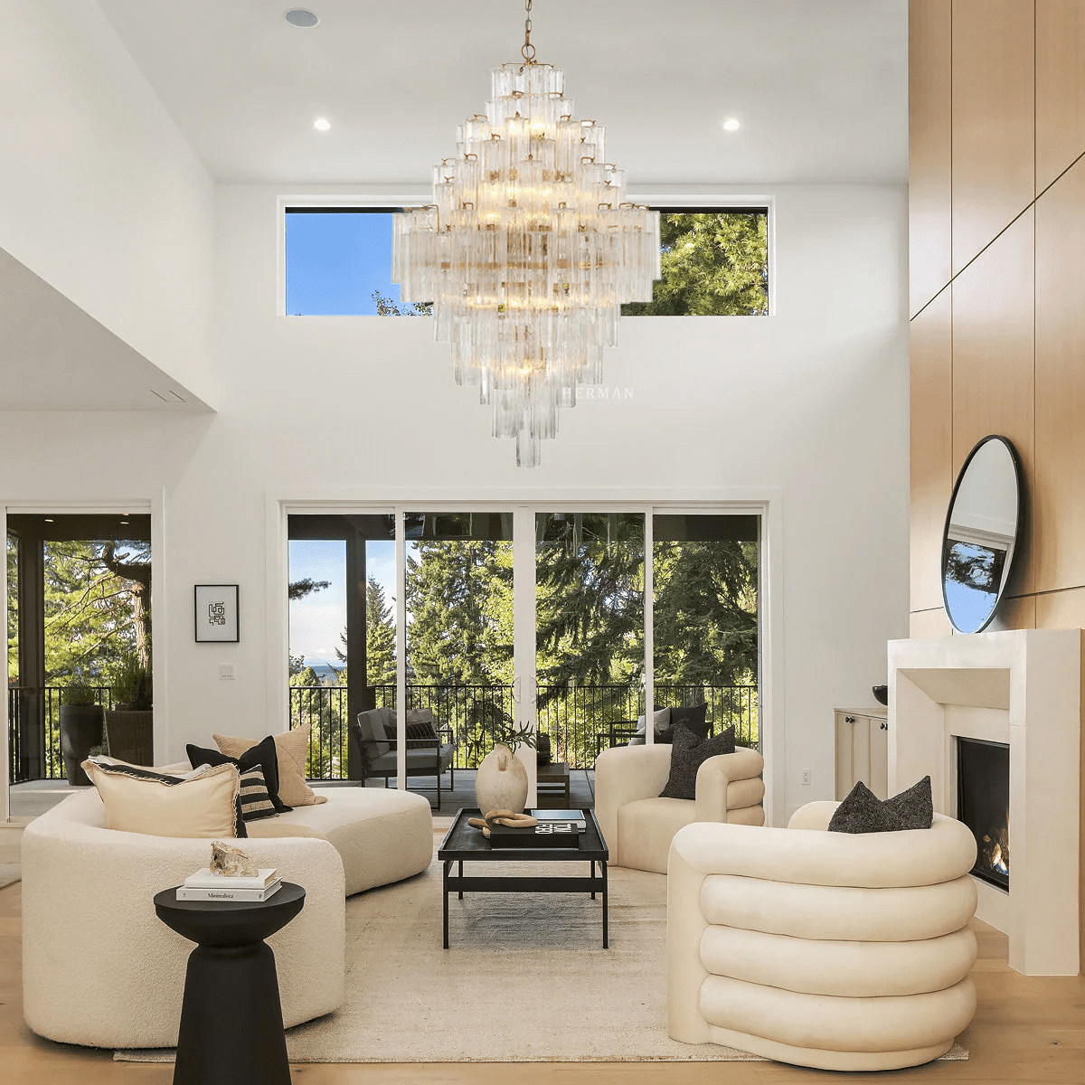 Addis Diamond Chandelier with amber glass in a bright living room with fireplace