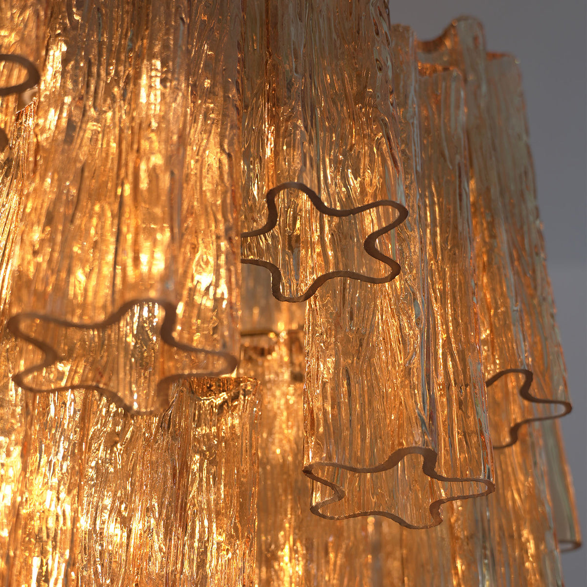 Close-up of the multi-tiered structure and glass tubes on the Addis Diamond Chandelier