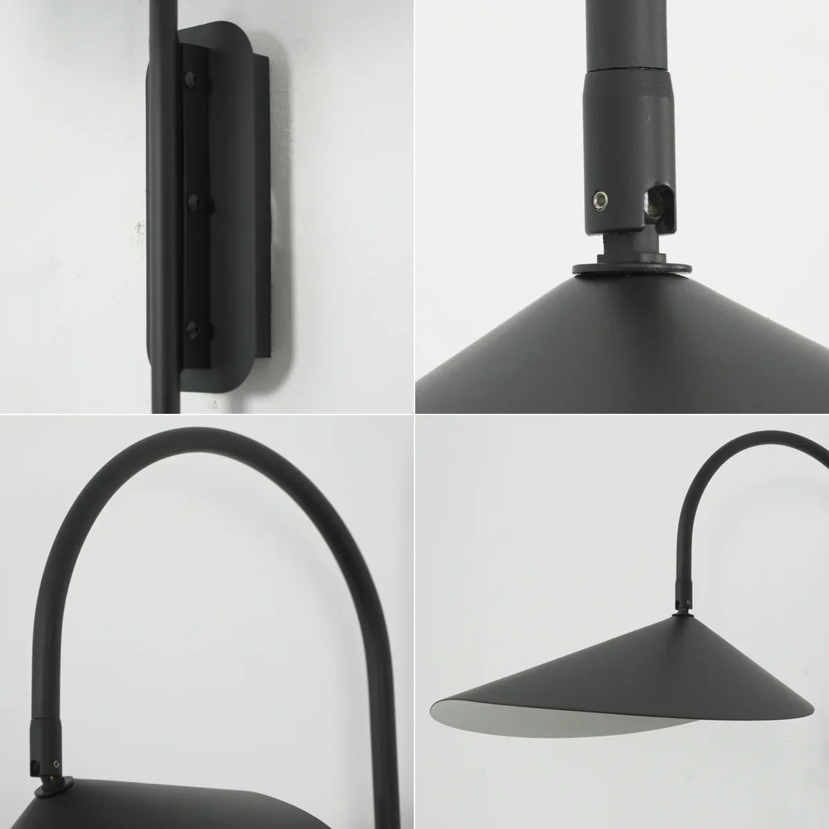 Close-up of the Arum Swivel Wall Lamp showing the warm light beam from the matte black shade