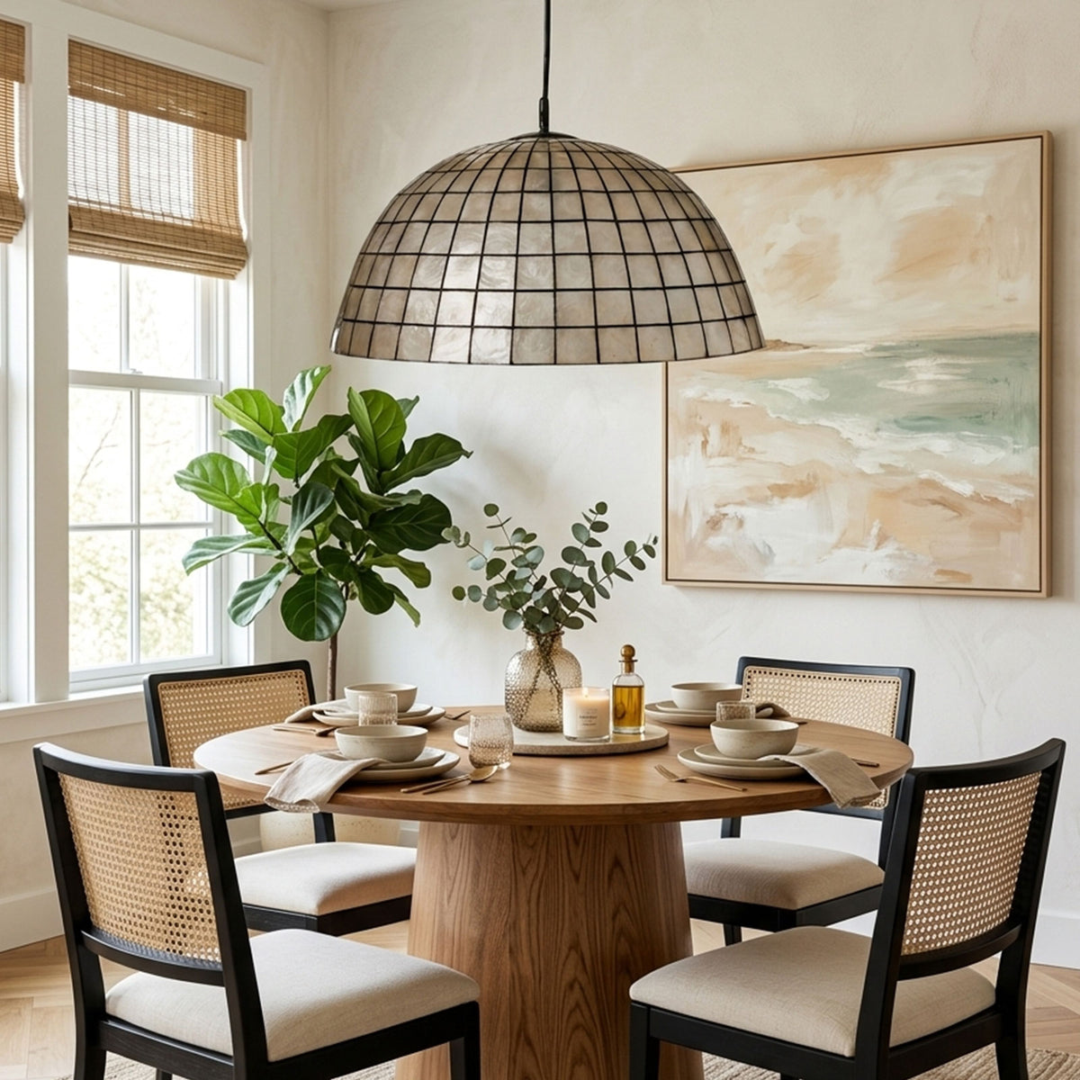Capiz Shell Dome Pendant Light with warm glow over a round wooden dining table Metavaya