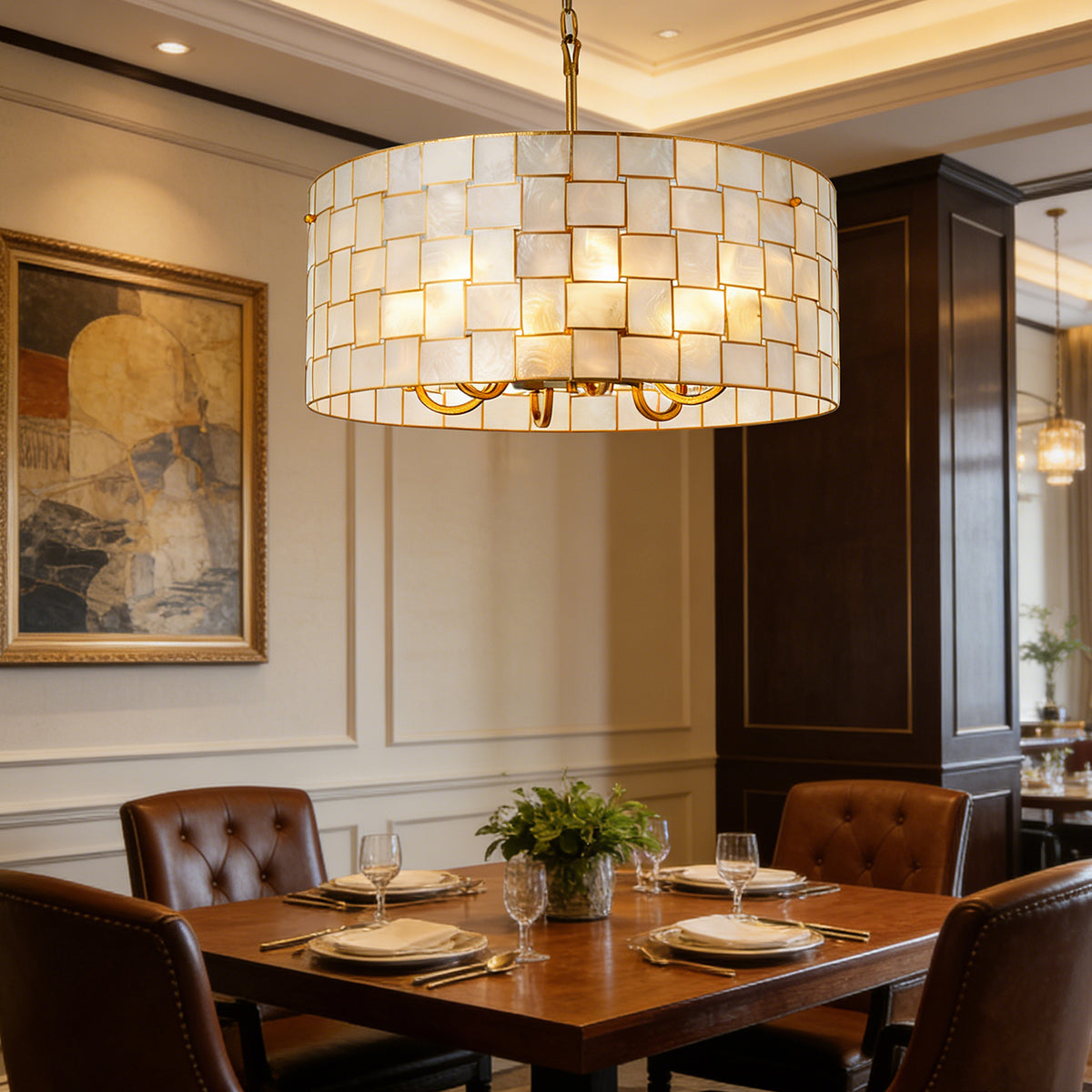 Capiz Shell Drum Chandelier above a dark wood dining table in a formal dining room Metavaya