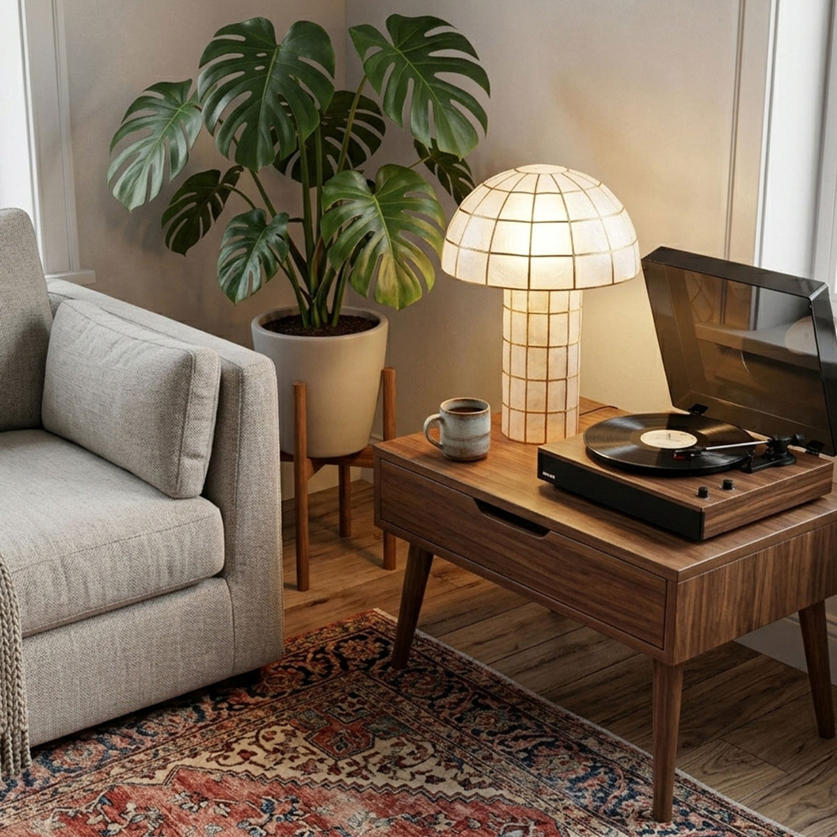 Capiz Shell Mushroom Table Lamp on a coffee table in a wabi-sabi living room with fireplace Metavaya