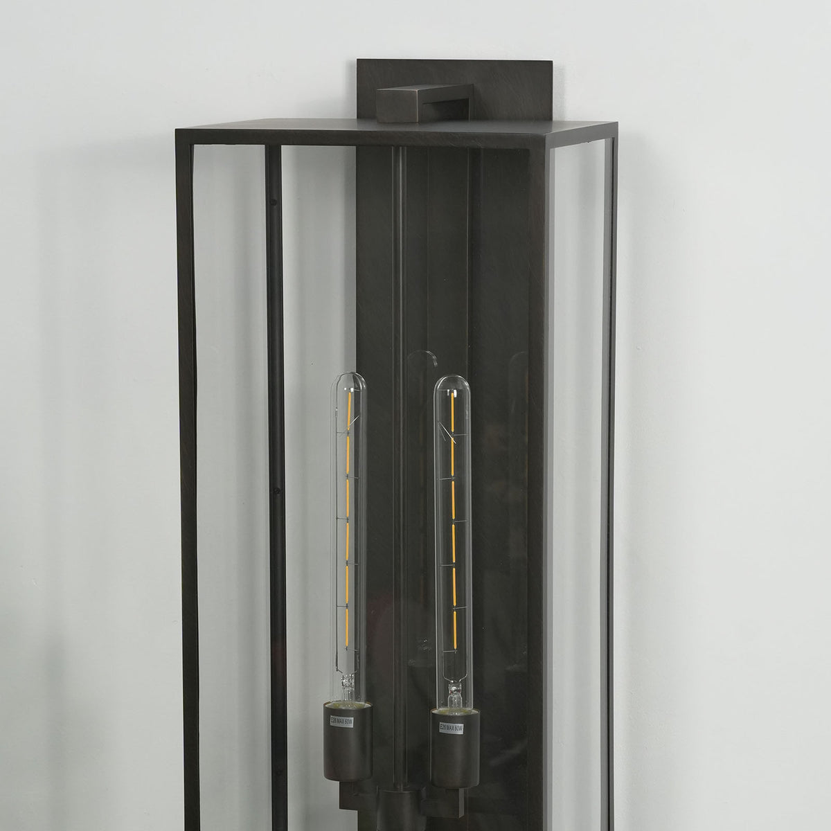 Front view of the black Faraday outdoor wall sconce, showing its full glass and metal design.