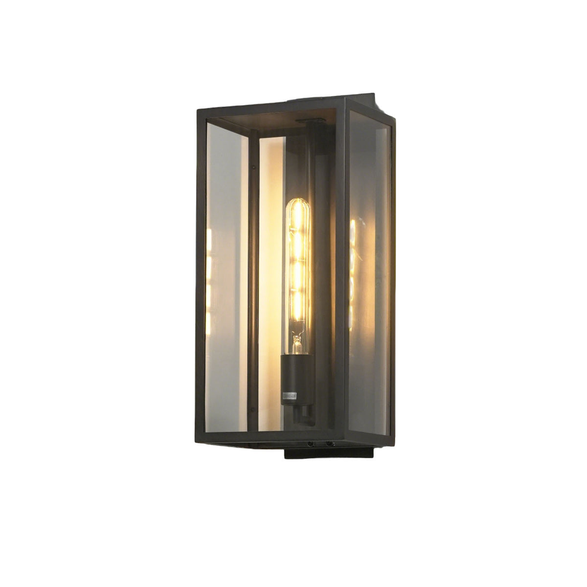 Close-up of the lit Faraday wall sconce, showing the warm glow diffused through the clear glass.