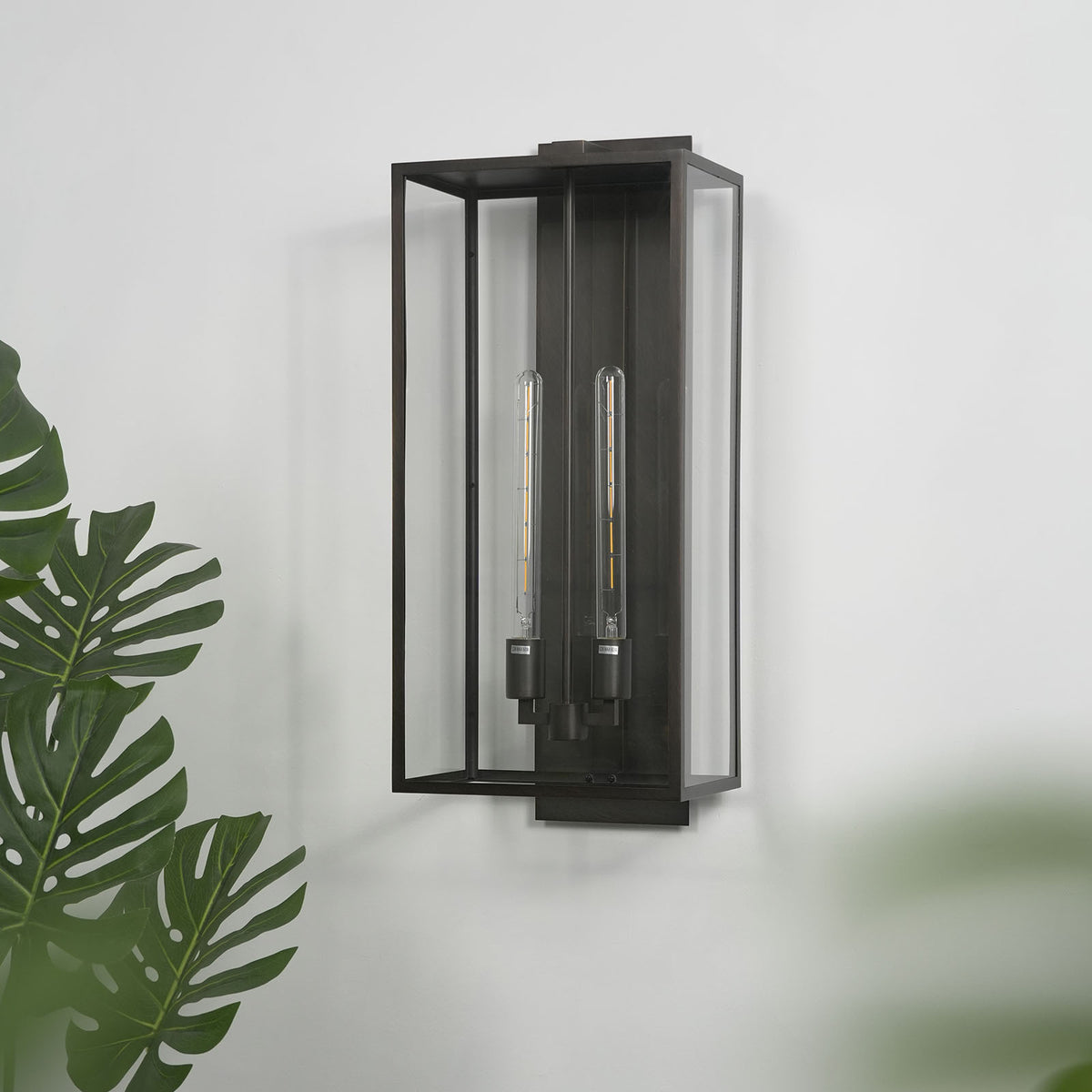 Close-up of the black metal wall mount and bracket on the Faraday outdoor wall sconce.