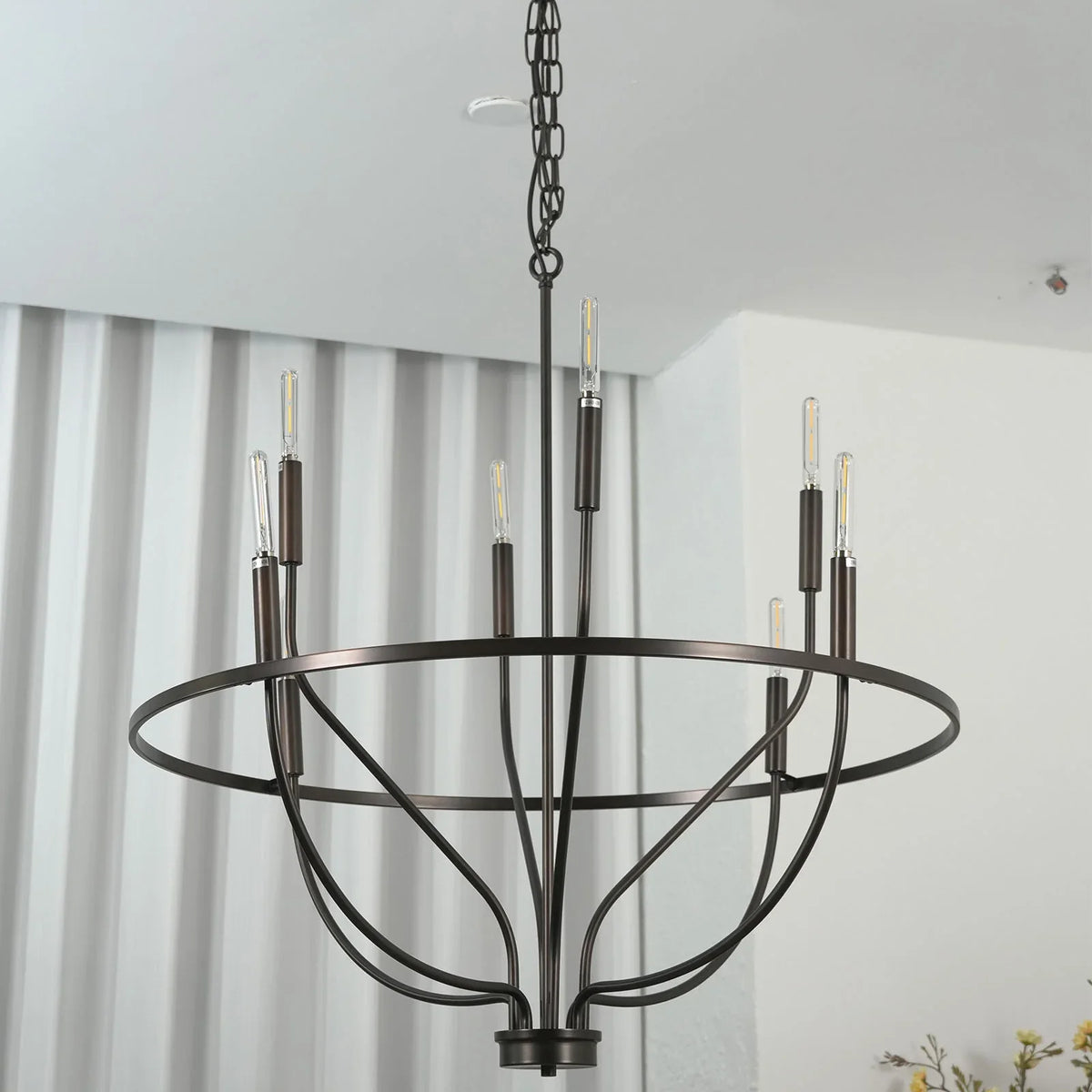 Greyson Bowl Chandelier in a bright room with sheer curtains and soft decor