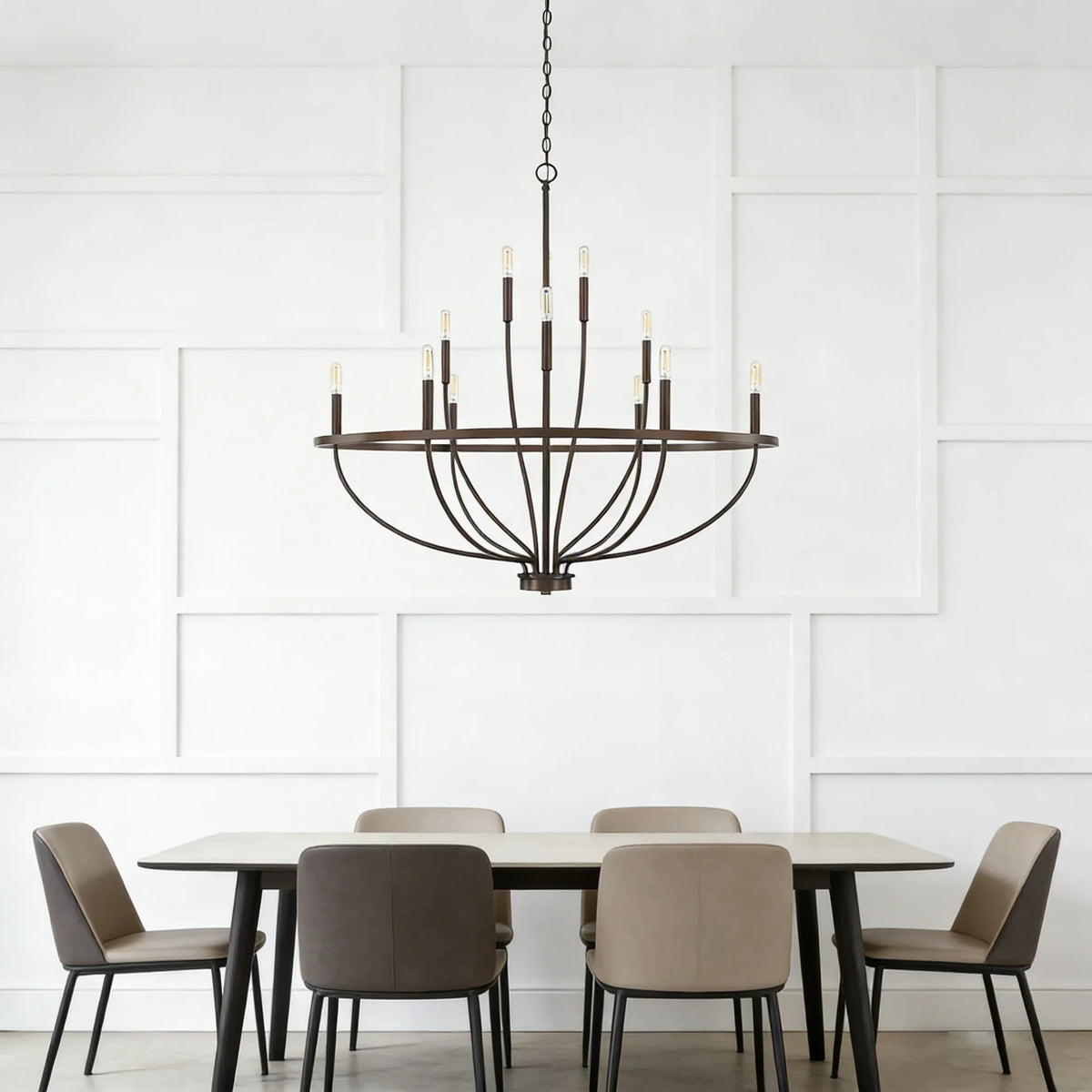 Greyson Bowl Chandelier above a formal dining table with upholstered chairs in a bright room