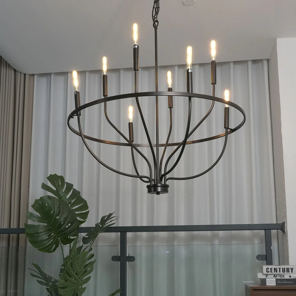 Chandelier in dark bronze, front view on white background