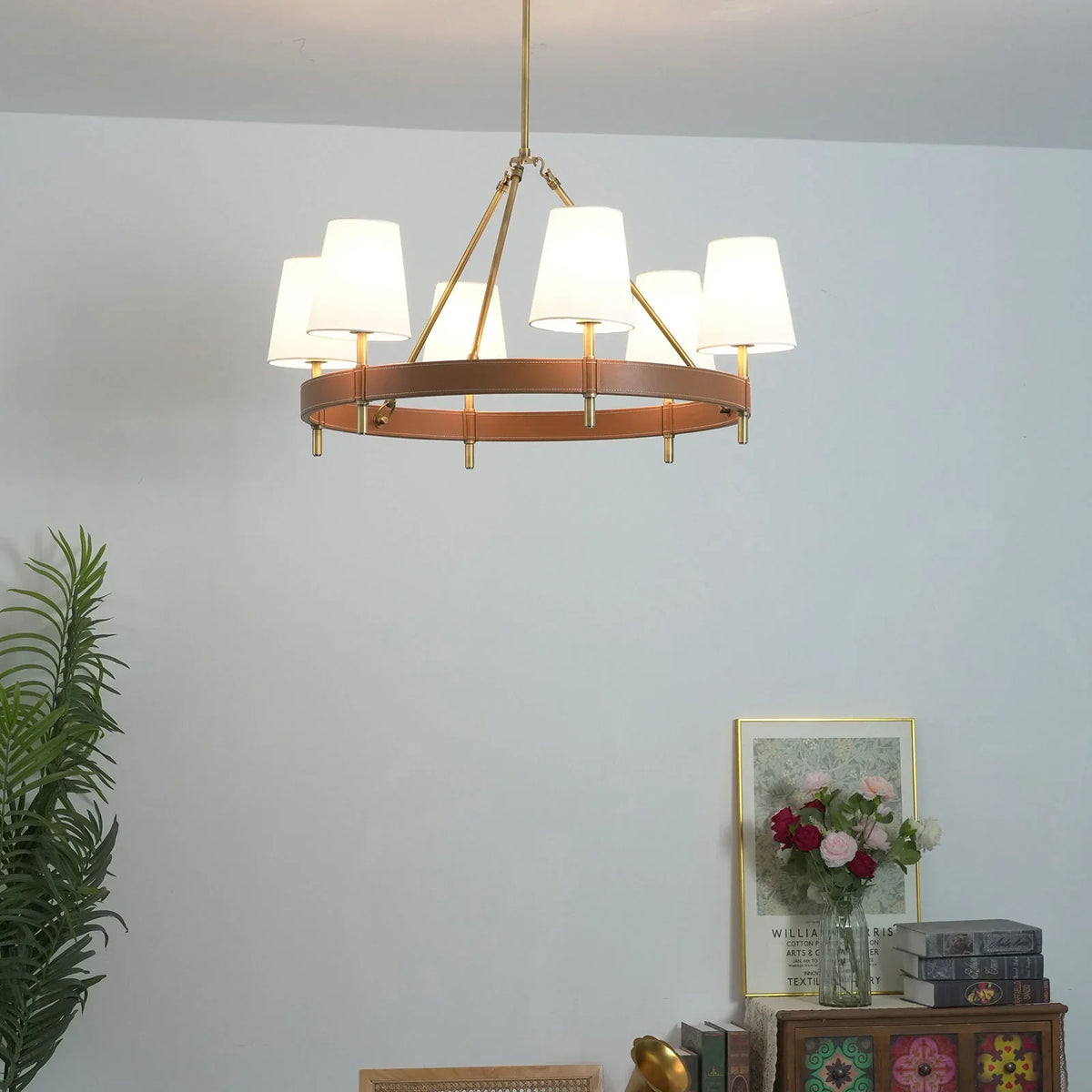 Leather Halo Ring Chandelier hanging in a minimalist corner with soft decor