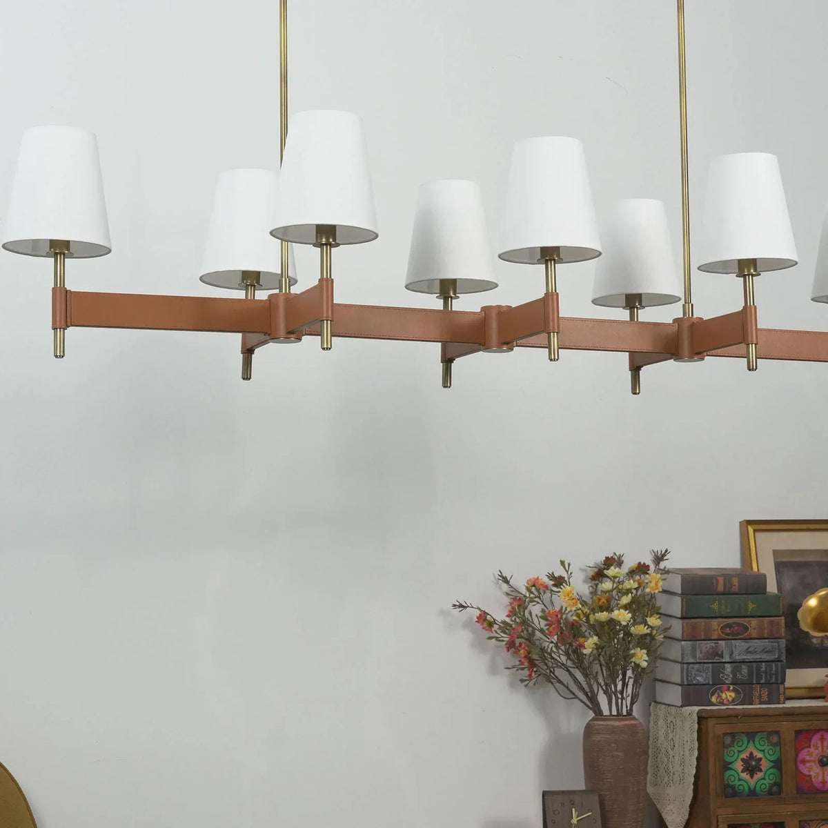 Front view of the round Leather Halo Ring Chandelier with warm light