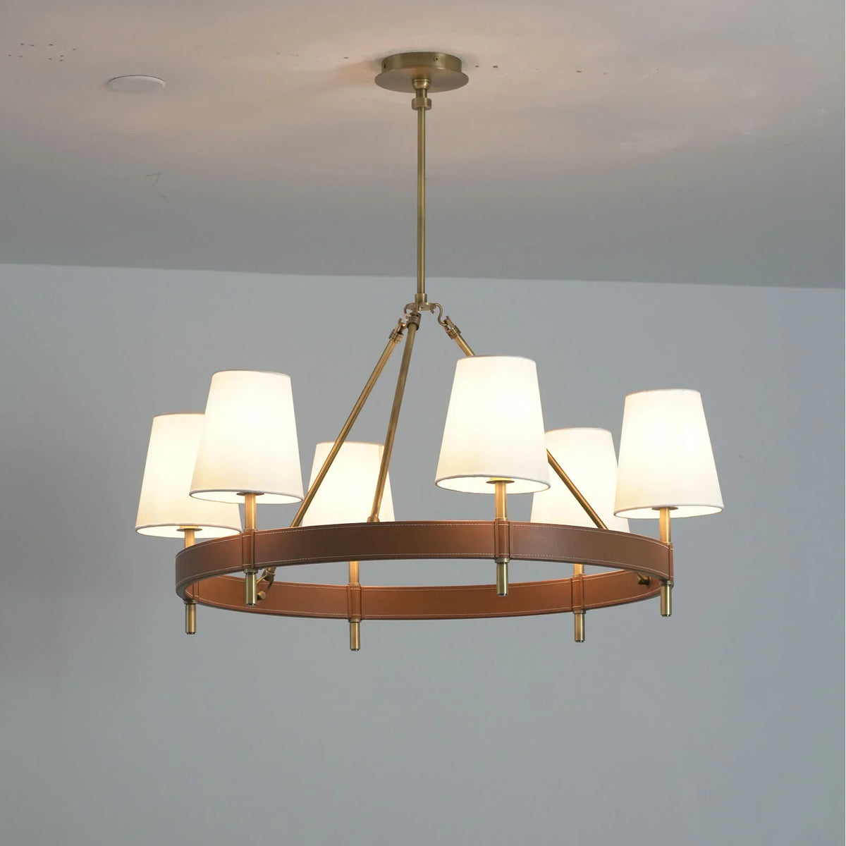 Low-profile Leather Halo Ring Chandelier on a plain white ceiling