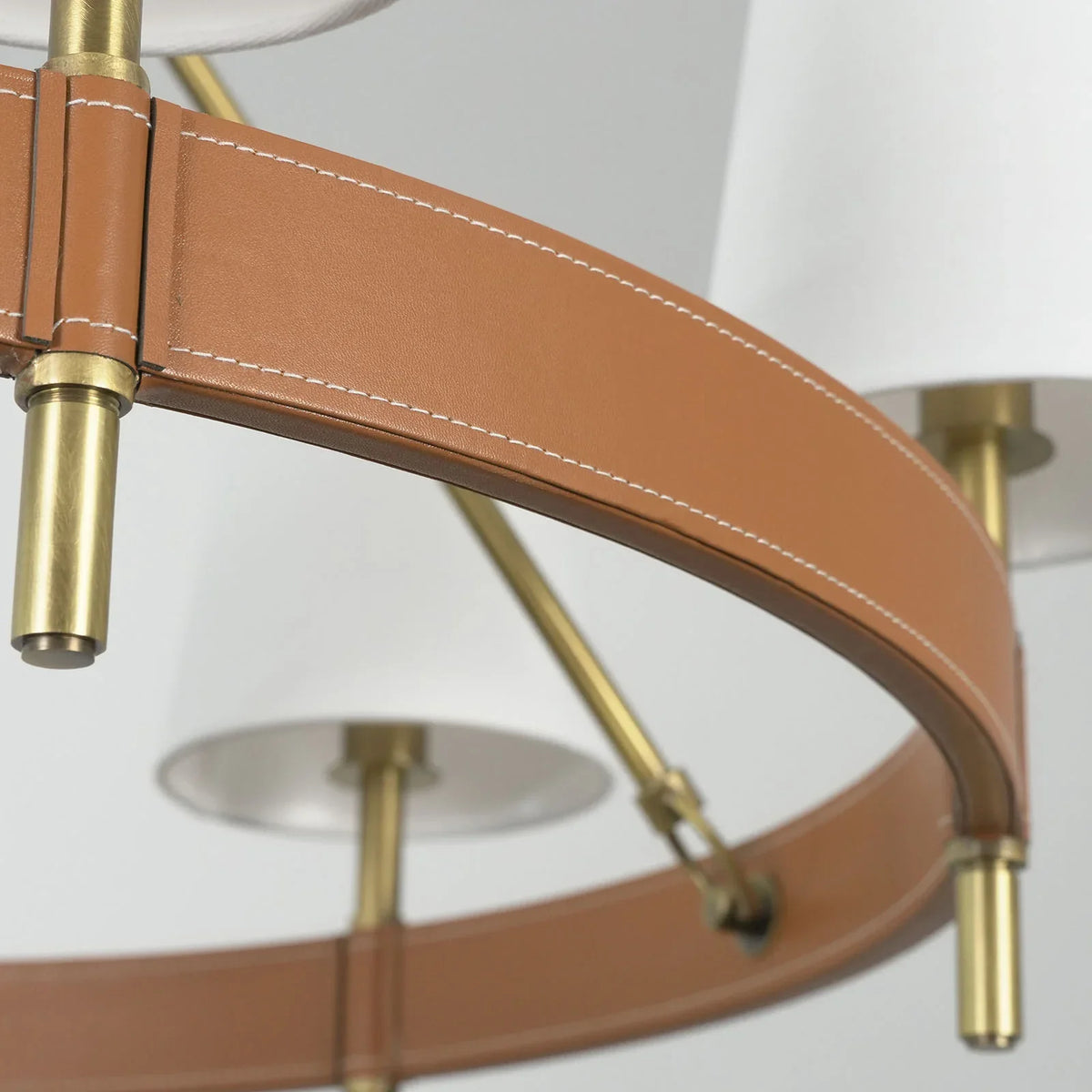 Leather Halo Ring Chandelier in a minimalist bedroom with neutral decor