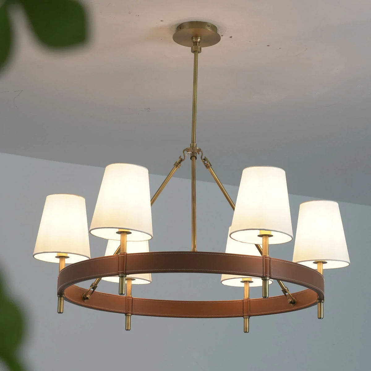 Side view of the round Leather Halo Ring Chandelier showing the layered design