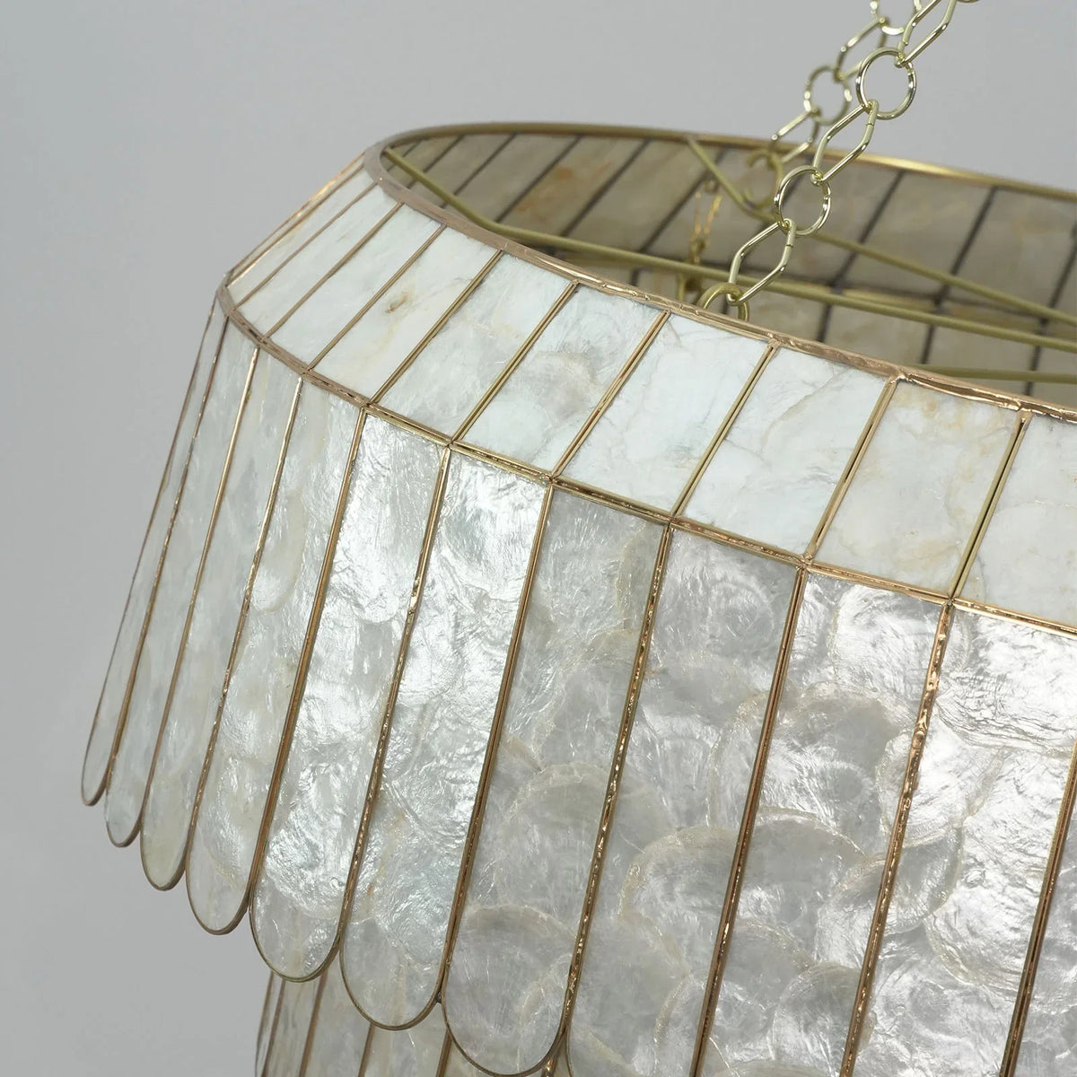Close-up of capiz shell panels on the Light Luxury Shell Chandelier showing natural texture