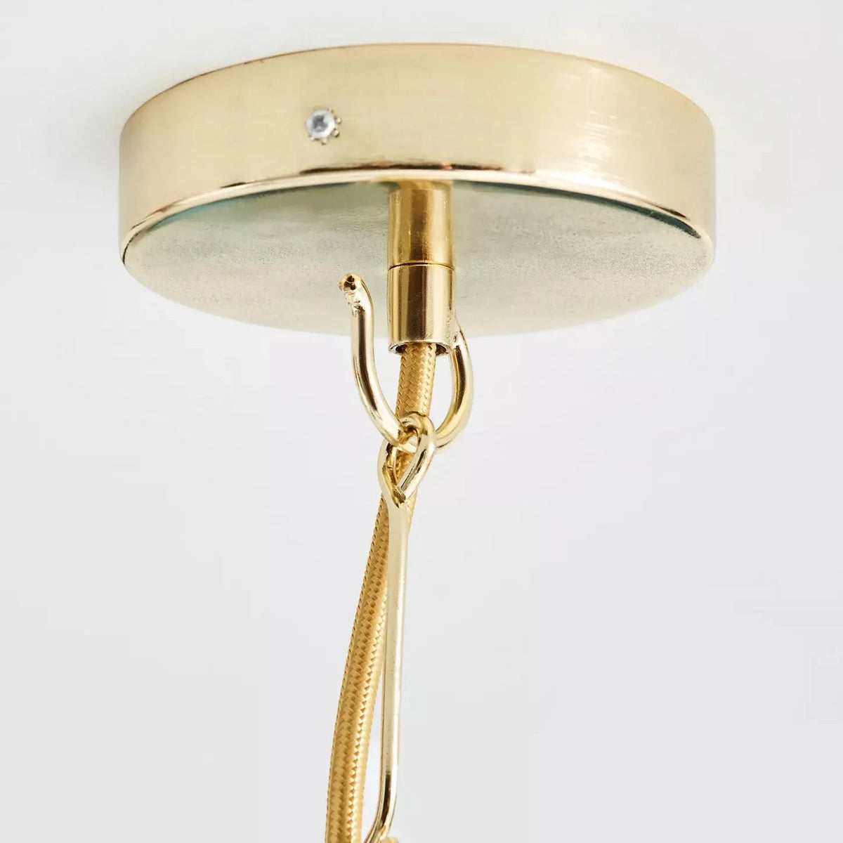 Close-up of the inner gold frame and capiz shell panels on the Light Luxury Shell Chandelier