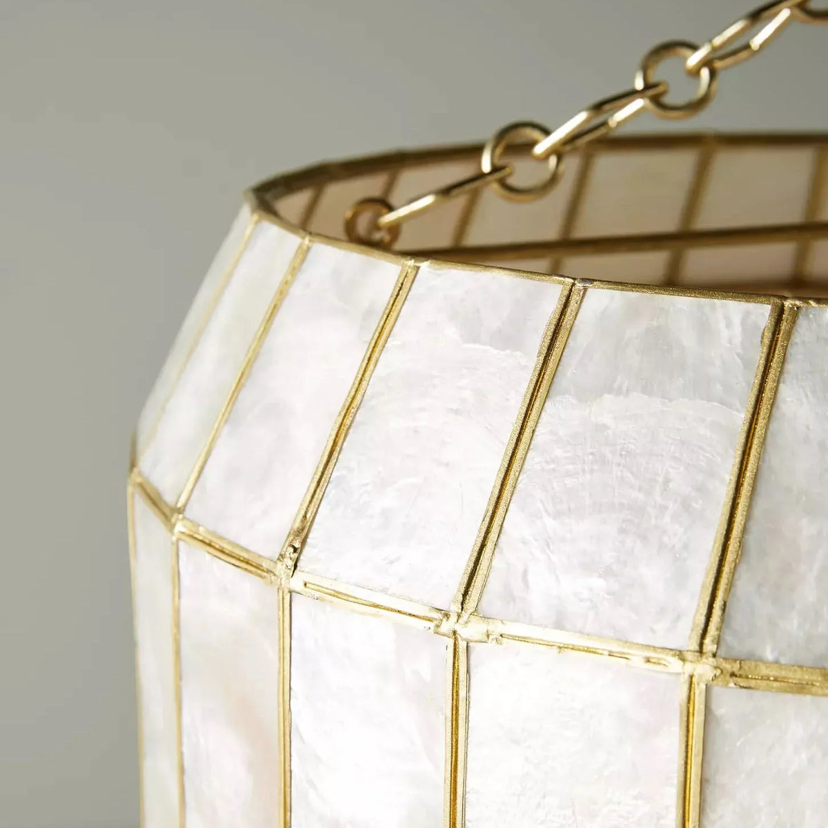 Bottom view close-up of the soft pink capiz shells on the Light Luxury Shell Chandelier