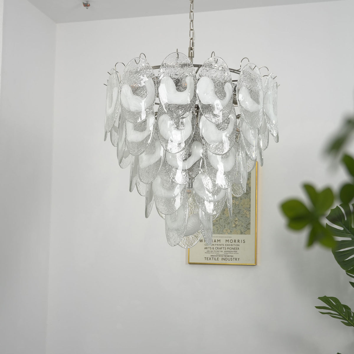Close-up of the silver ceiling mount and hanging chain on the Mazzega-style chandelier.