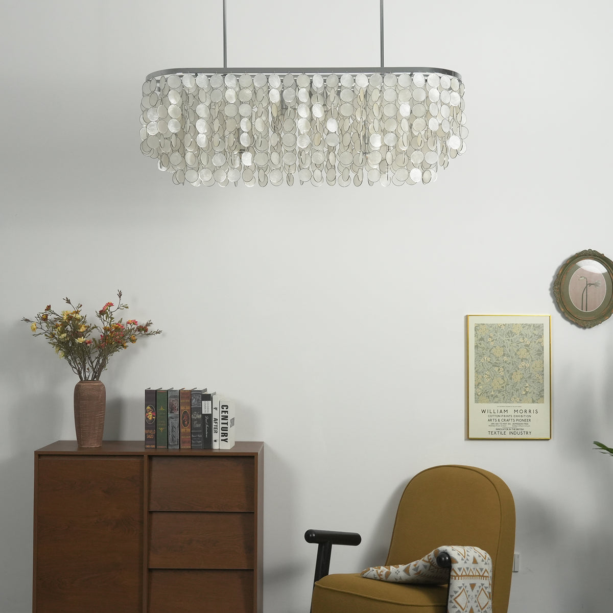 View of the rectangular capiz shell chandelier from below, showing its hanging rods and ceiling mount.