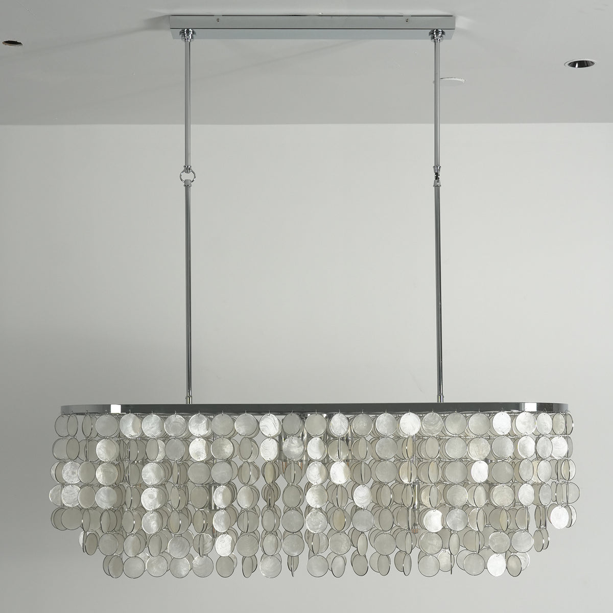 Front view of the rectangular capiz shell chandelier against a plain white background, showing its symmetrical design.