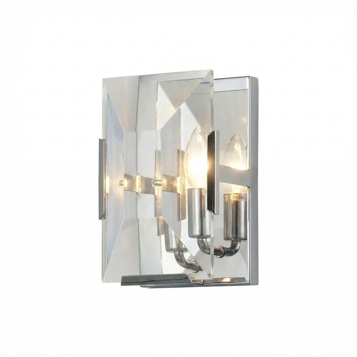 Close-up of the black frame and crystal facets on the three-headed wall lamp.