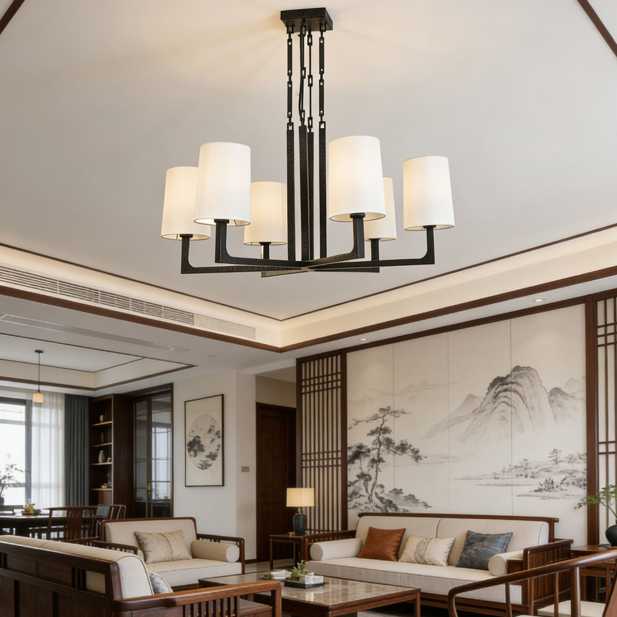 Wright-inspired round chandelier in a modern living room with Chinese ink painting decor.