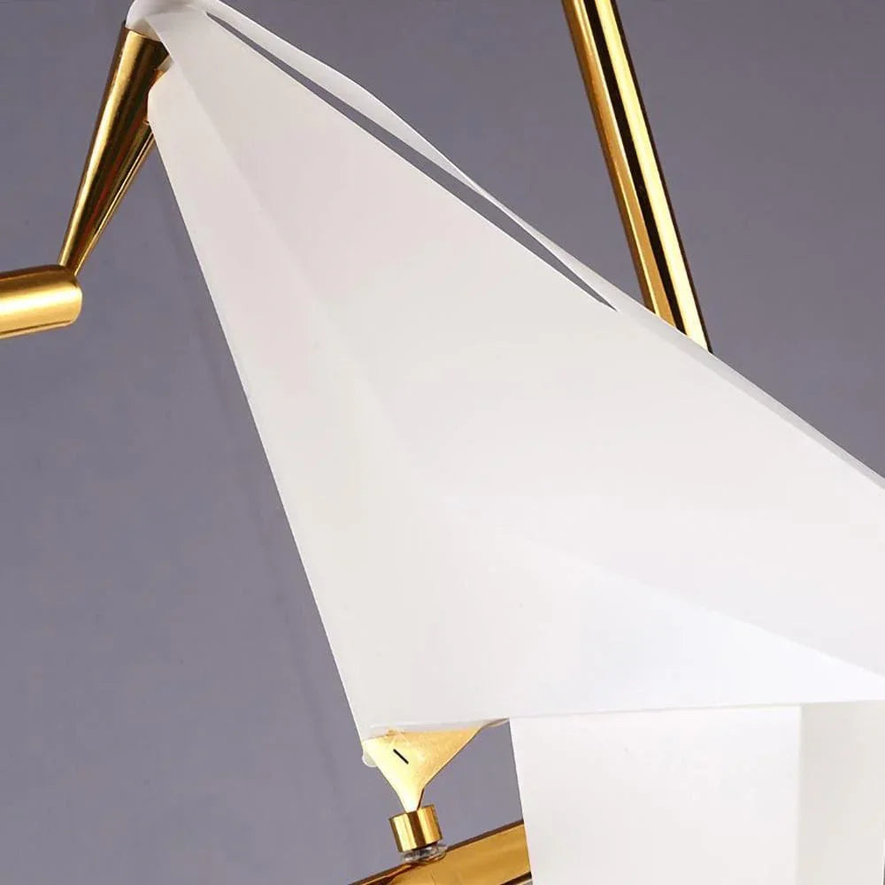 Modern gold and white geometric chandelier with sleek crystal accents