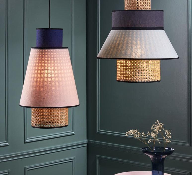 Modern pendant lights with woven accents and soft glow, perfect for stylish interior illumination.