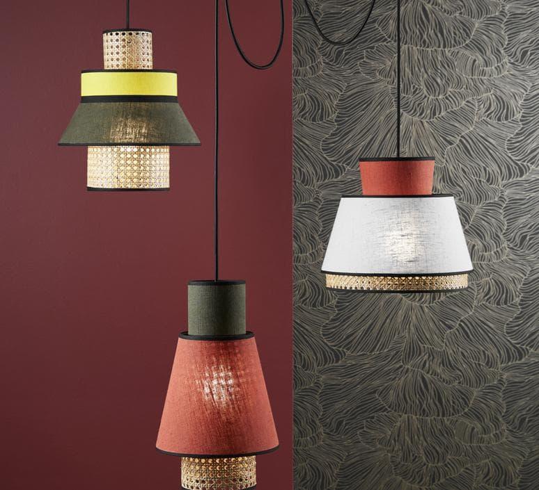 Modern layered pendant lights with woven accents and fabric shades in bold colors for stylish interior lighting