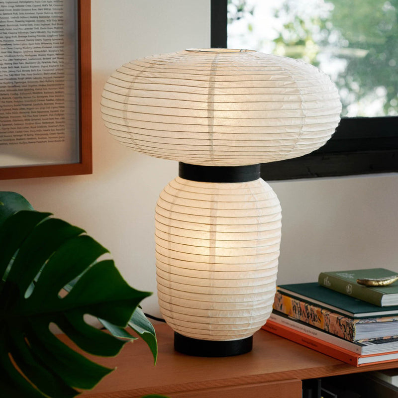 Rice paper shade and lacquered oak frame detail of the Solaine Paper Lantern Table Lamp