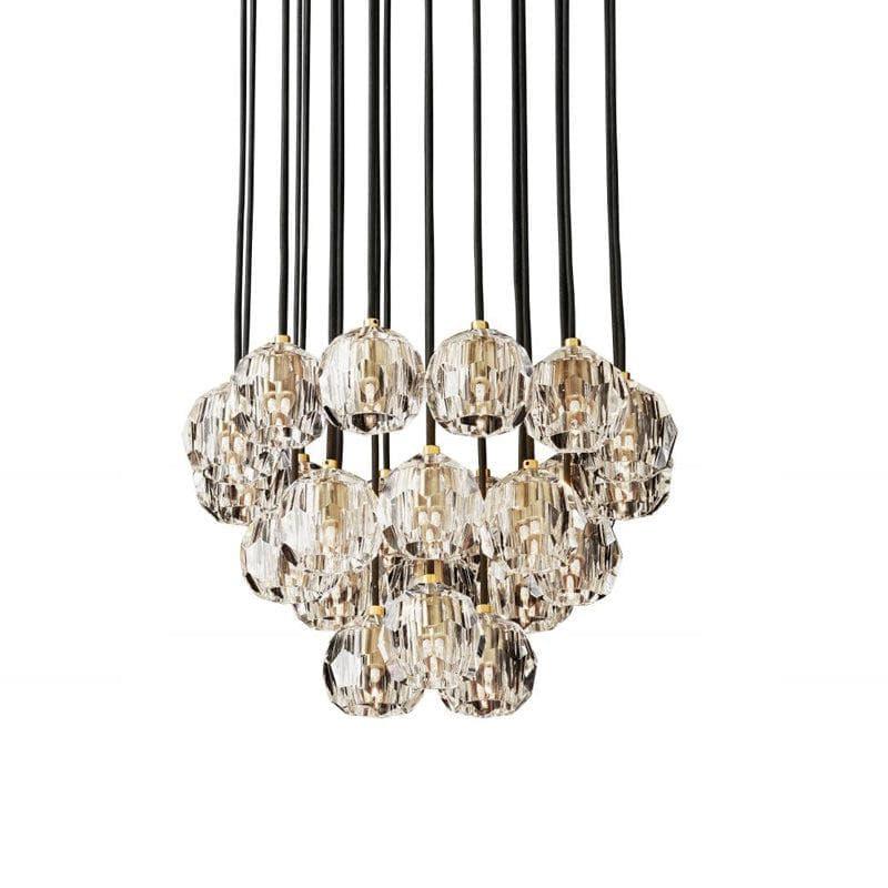 Modern crystal chandelier with faceted glass globes and black cords, elegant lighting for contemporary spaces