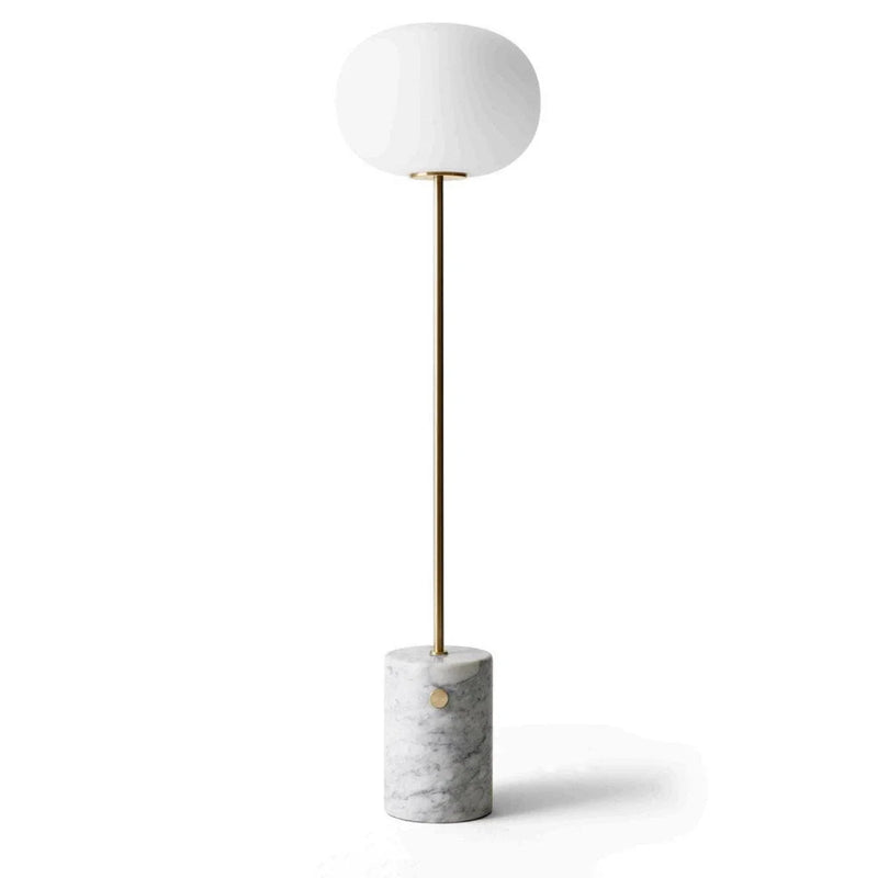 Modern floor lamp with marble base and brass stem, sleek white globe shade for stylish illumination